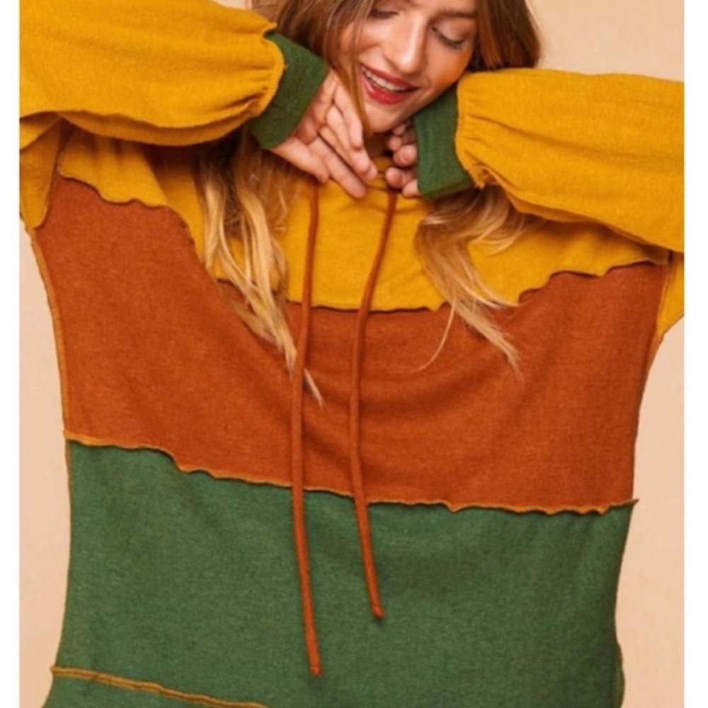 Cashmere soft feel knit color block hoodie.
